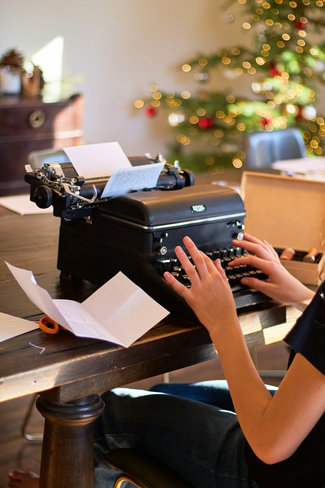 mystery writer at typewriter