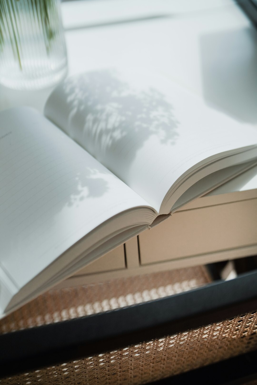 open book on wooden table