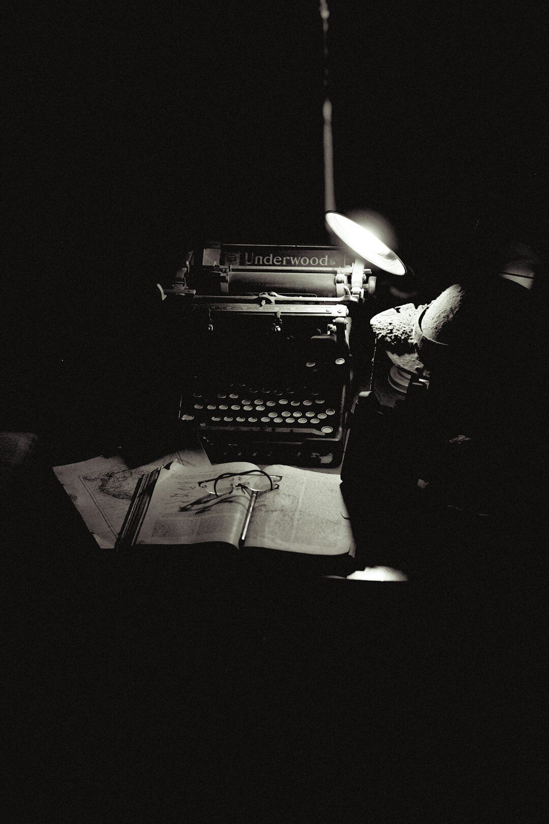 mystery writer at typewriter